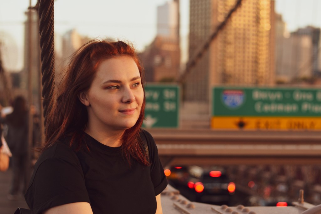 Me (Pashe Taylor) on the Brooklyn Bridge at sunset